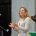 Dr Paula Gooder talks in a church.