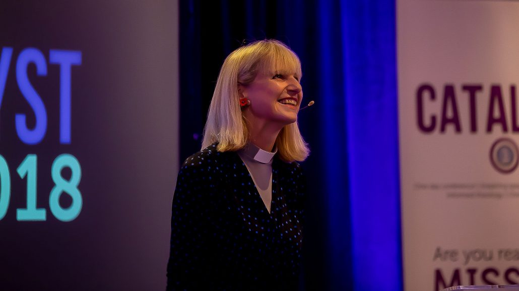 Rosie Harper, medium close up wearing dog collar and microphone